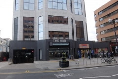 23 The Hub building exterior with car park Harrow serviced apartments